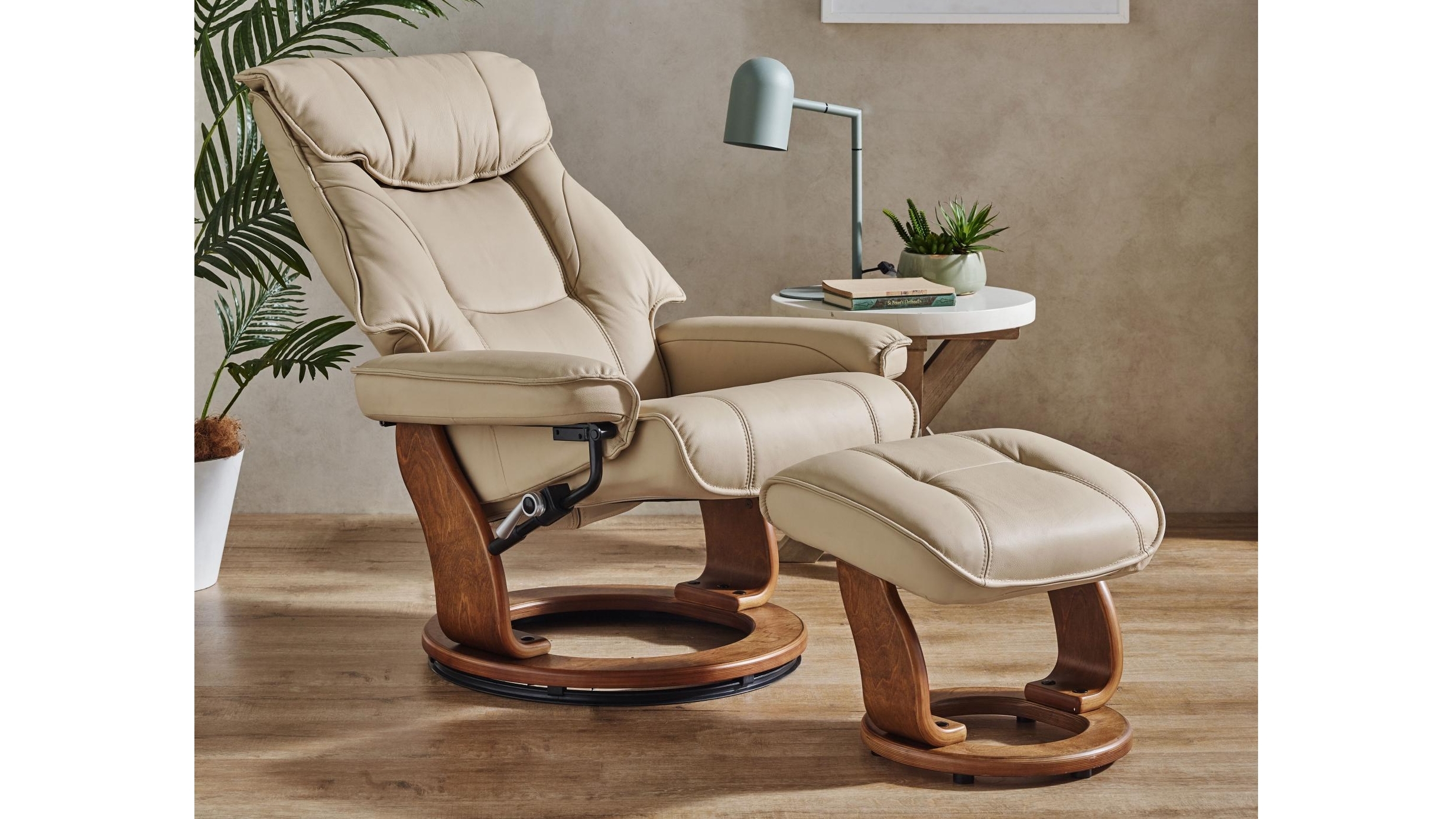 Orebro leather recliner store chair and footstool