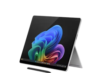 Microsoft Surface tablet with a kickstand extended, stylus placed in front, displaying a vibrant abstract screen design.