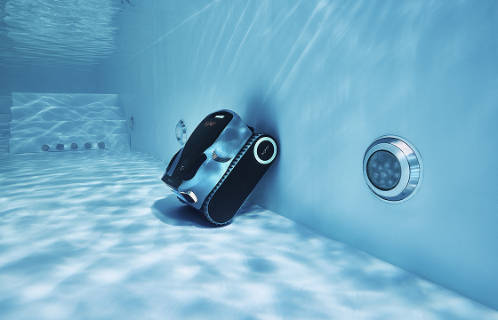 Aiper Scuba X1 Pro Max robotic pool cleaner climbing an underwater pool wall