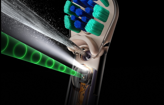 Dyson CameraJet™ toothbrush combining sonic bristles and a precision water jet to clean between teeth 
