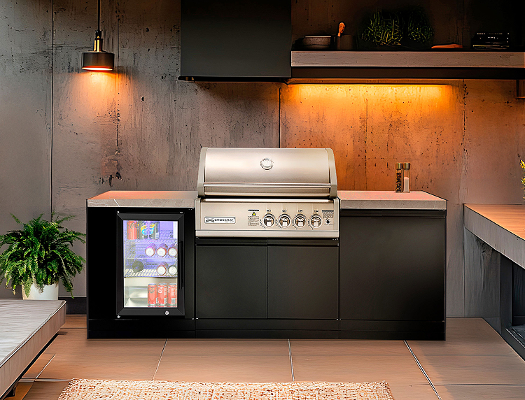Modern black outdoor kitchen with built-in BBQ, sink, storage and drinks fridge 