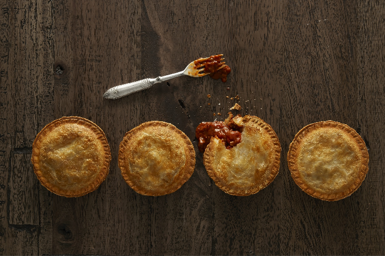 A row of delicious home made pies